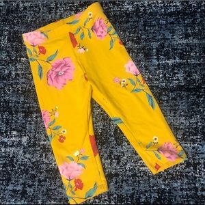 Old navy mustard leggings w/ 🌺 💐🌸.  12-18 mos